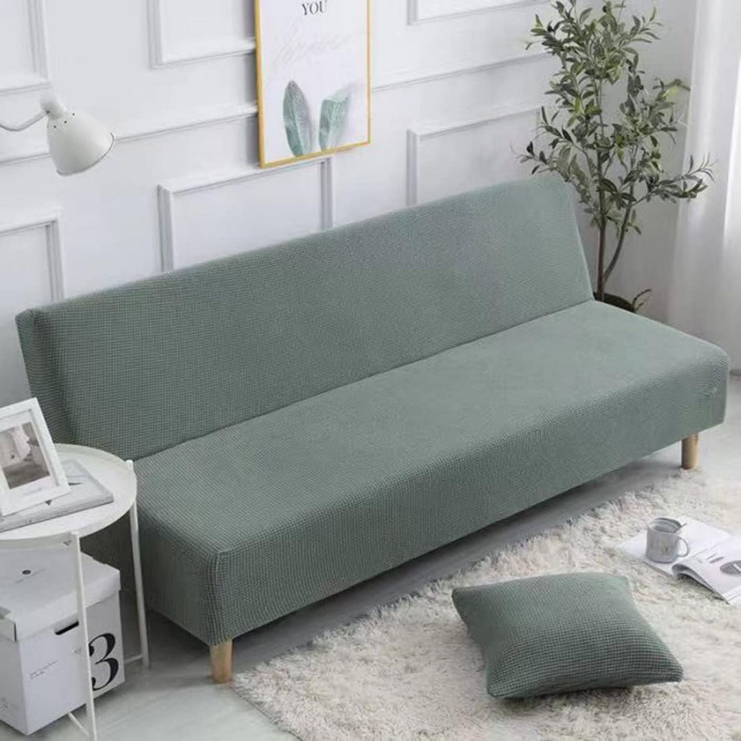 Divano da soggiorno verde con braccioli